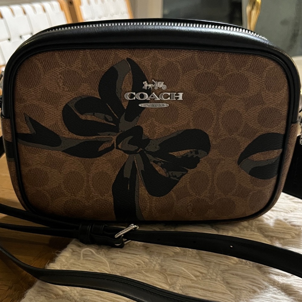 Coach Brown Signature Canvas Crossbody with Black Bow Print - Picture 2 of 10